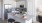 a kitchen with white cabinets