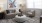 a living room with a couch and coffee table