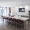kitchen with ample counter-space, modern appliances and bright lighting