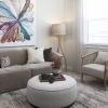 living room with a large window and open spaces